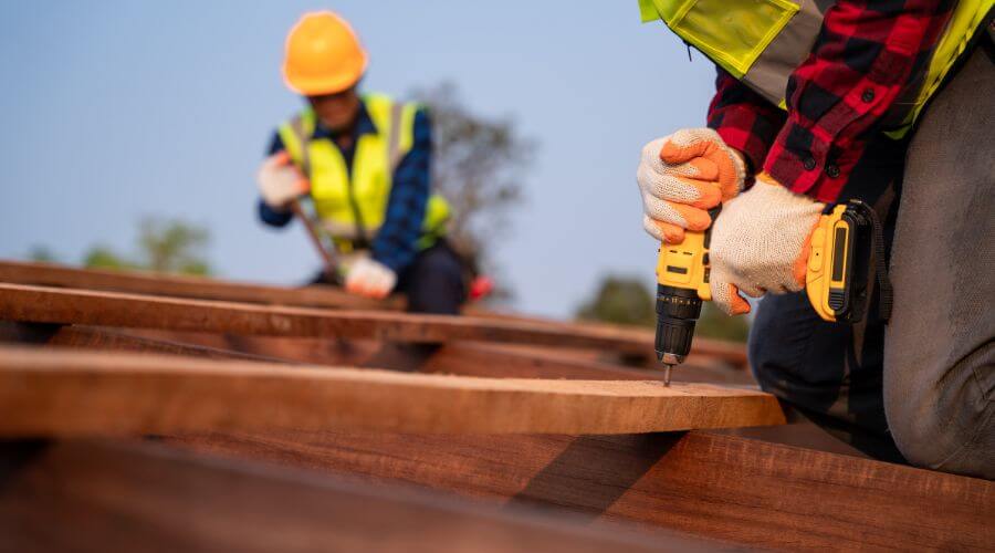 Expert tile roof repair services in Doucette, TX